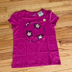 Girls pink t-shirt. Soccer ball design on the front. Never worn before.